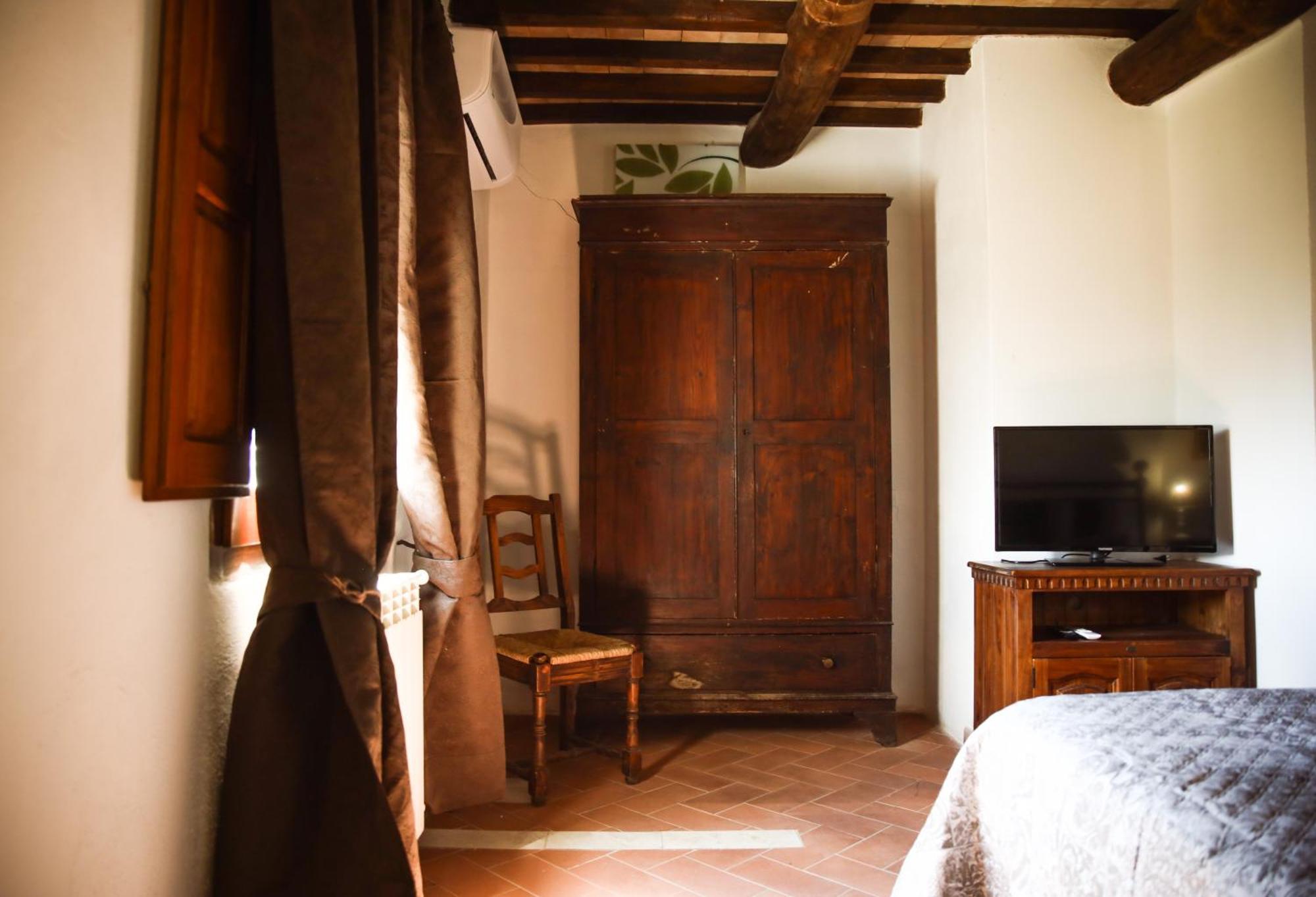 Bio Agriturismo Poggio Aione Сатурния Экстерьер фото